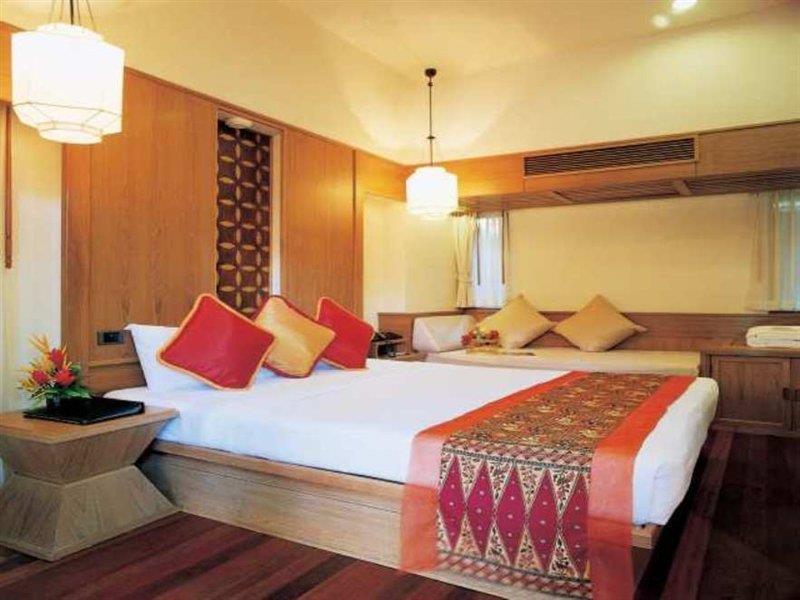 Chaweng Regent Beach Resort Camera foto A bedroom at the Taj Bengal